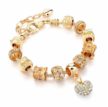 Load image into Gallery viewer, Luxury Golden Plated Crystal Heart Charm Bracelet in 5 styles
